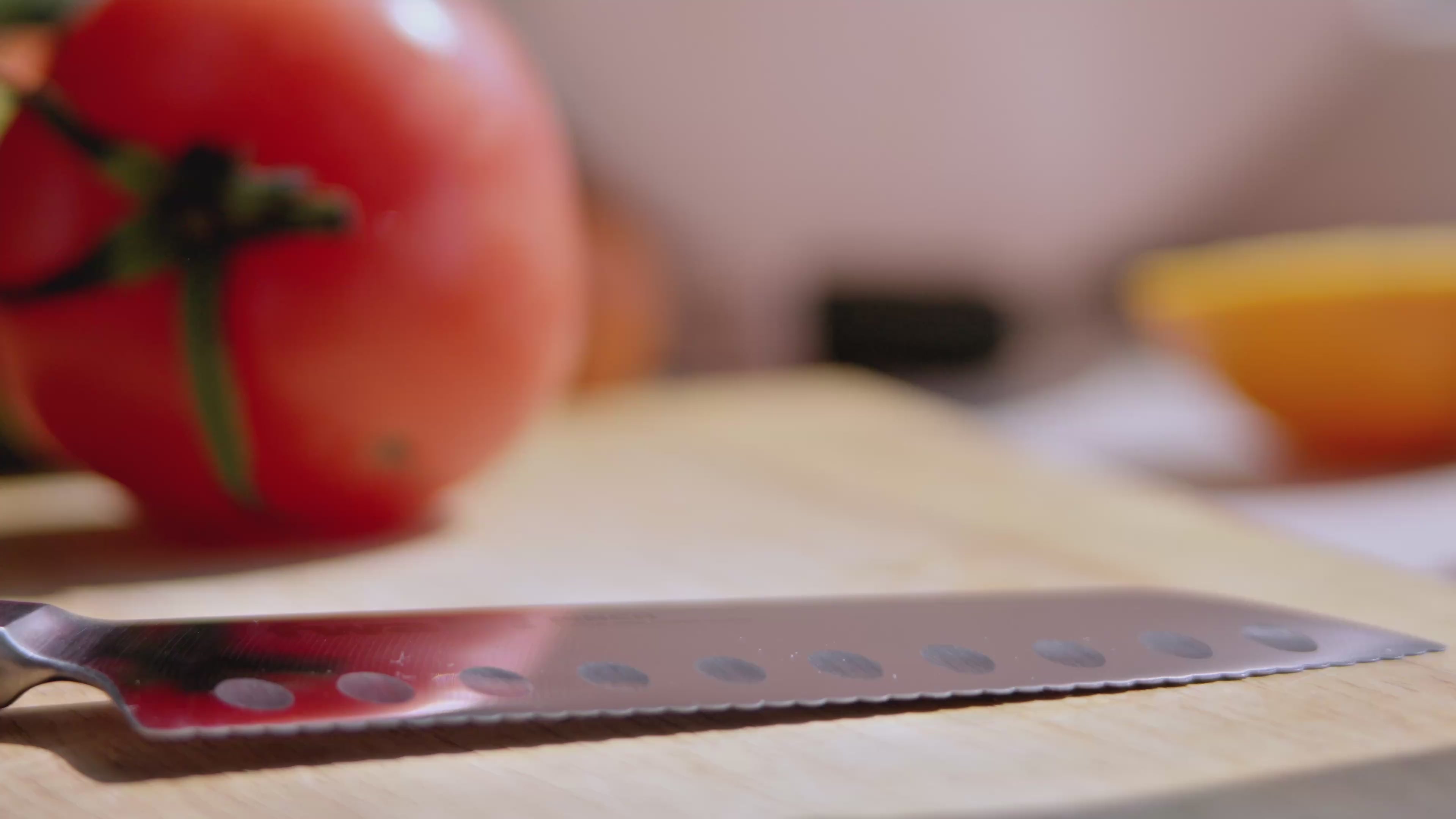 Load video: Demonstration of Pinch Mini cutting various vegetables but not able to puncture a balloon.